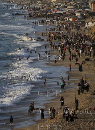 Internally displaced Palestinians at a beach in southern Gaza