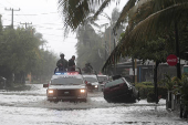 Slow-moving storm John dumps more rain on Mexico's Pacific coast