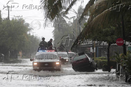 Slow-moving storm John dumps more rain on Mexico's Pacific coast