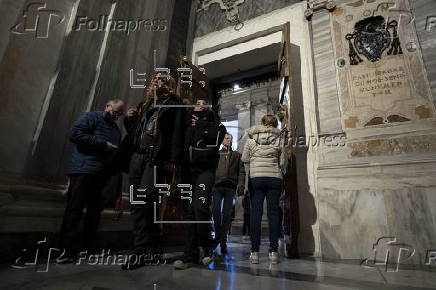 People walk through the Holy Door at Rome's Basilica of Saint Mary Major