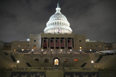 General view shows the West front of the U.S. Capitol building during snowfall in Washington