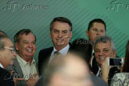 Bolsonaro e Alberto Fraga ( dir.) em evento no Palcio do Planalto