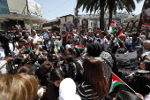 Palestinians rally to mark Prisoners' Day, in the West Bank city of Nablus