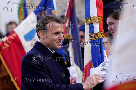 FILE PHOTO: President Macron pays homage to the local Resistance during WWII as part of the 80th anniversary of the liberation of Nazi occupied France