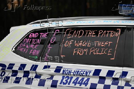 Victoria police officers and recruits walk off the job over pay and working conditions