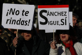 People march to show support for Spain's PM Sanchez, in Madrid