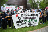 Pro-Palestinian demonstrators occupy a courtyard at Freie Universitat (FU) Berlin