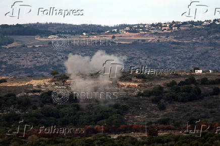 Smoke rises after rockets are fired from Lebanon towards Israel