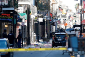 Debris is left along Bourbon Street after a pickup truck was driven into a large crowd in the French Quarter of New Orleans