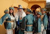 The Three Wise Men visit children and elderly people, ahead of the Epiphany parade, in Ronda