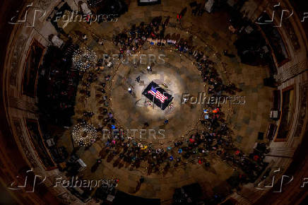 Former U.S. President Jimmy Carter lies in state at the U.S. Capitol building in Washington