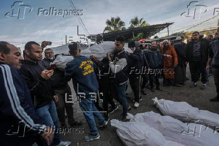 Palestinians mourn their dead at Deir Al Balah hospital after Israeli airstrike in central Gaza