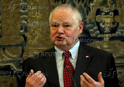 FILE PHOTO: FILE PHOTO: Poland's central bank governor-designate Glapinski speaks during a hearing at a parliamentary panel at the Parliament in Warsaw