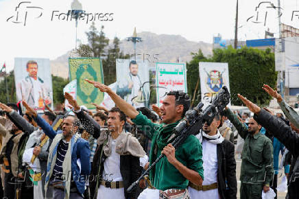FILE PHOTO: Houthi followers parade in Sanaa