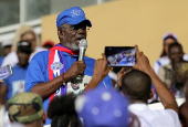 FILE PHOTO: Former Liberian warlord Prince Johnson delivers a speech during a presidential campaign rally in Monrovia