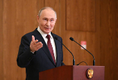 Russian President Putin attends a press conference in Astana