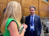 FILE PHOTO: St. Louis Federal Reserve Bank President Alberto Musalem speaks with University of Pennsylvania professor Christina Parajon Skinner on the sidelines of a monetary policy conference at Stanford University's Hoover Institution in Palo Alto