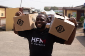 Boxes of supplies are distributed to the poor in Lagos