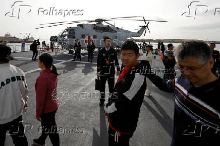 Chinese People's Liberation Army (PLA) Navy opens warships for public viewing in Qingdao