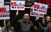 Congress members oppose a reform during a session, in Mexico City