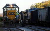 FILE PHOTO: A CSX coal train moves past an idling CSX engine at the switchyard in Brunswick, Maryland
