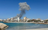 Smoke billows after an Israeli strike, amid the ongoing hostilities between Hezbollah and Israeli forces, in Tyre