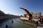 Traditional New Year's diving into the Tiber River in Rome