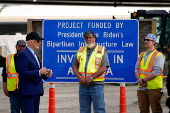 U.S. President Joe Biden meets with workers and representatives from the Allegheny County Airport Authority on a construction site at Pittsburgh International Airport in Coraopolis