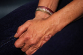 The hands of Einav Zangauker, mother of Israeli hostage Matan Zangauker who was seized by Hamas on October 7 and remains in Gaza, during an interview with Reuters in Tel Aviv