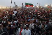 Supporters of jailed former Pakistani Prime Minister Imran Khan attend a rally in Swabi