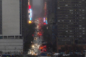 Traffic is pictured along 42nd street in New York during a rainy day as it is seen from Weehawken, New Jersey