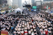 Supporters of South Korean President Yoon hold rally ahead of impeachment vote