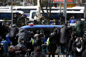 A motorcade believed to be carrying South Korea's impeached President Yoon Suk Yeol arrives at a court, in Seoul