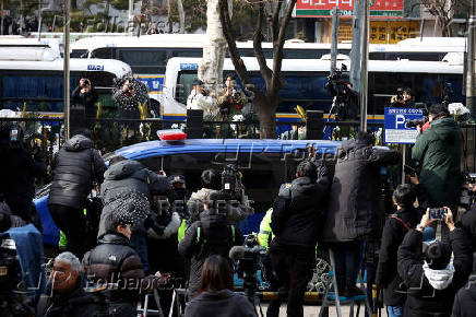 A motorcade believed to be carrying South Korea's impeached President Yoon Suk Yeol arrives at a court, in Seoul