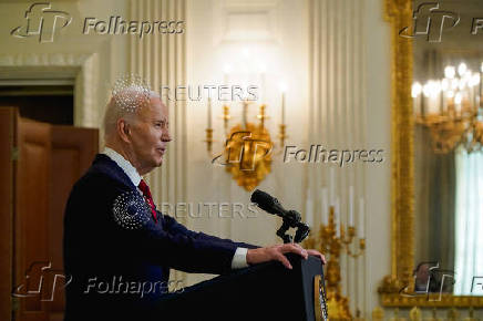 U.S. President Biden speaks after signing into law a bill providing new aid to Ukraine for its war with Russia in Washington