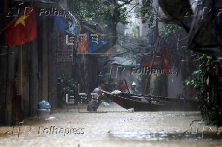 Red River overflows causing severe flooding in Hanoi following Typhoon Yagi