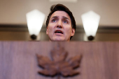 Canada's Prime Minister Justin Trudeau takes part in a press conference on Parliament Hill in Ottawa