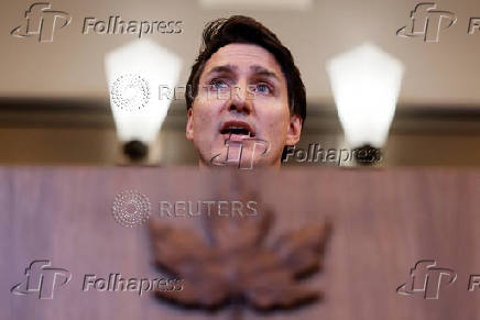 Canada's Prime Minister Justin Trudeau takes part in a press conference on Parliament Hill in Ottawa