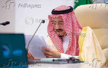 Saudi King Salman bin Abdulaziz gives virtual speech during the 15th annual G20 Leaders' Summit in Riyadh, Saudi Arabia