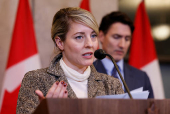 Canada's Canada's Minister of Foreign Affairs Melanie Joly and Prime Minister Justin Trudeau take part in a press conference on Parliament Hill in Ottawa