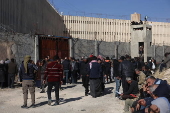 Syrians search for detainees at Sednaya prison after rebel takeover of Damascus