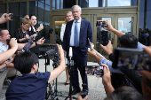 WikiLeaks founder Julian Assange holds a press conference at U.S. District Court in Saipan