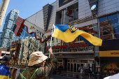 Protesters gather outside the Toronto International Film Festival (TIFF) screening of 'Russians at War', in Toronto