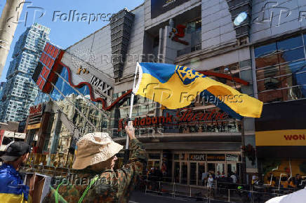 Protesters gather outside the Toronto International Film Festival (TIFF) screening of 'Russians at War', in Toronto