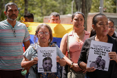 Relatives of detained Venezuelans protest, outside the public prosecutor's headquarters, in Caracas