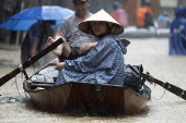 Red River overflows causing severe flooding in Hanoi following Typhoon Yagi