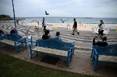 Tar balls washed ashore forces closure of Coogee Beach