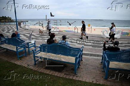 Tar balls washed ashore forces closure of Coogee Beach