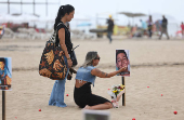 NGO Rio de Paz protests against children shot dead during police operations, at Copacabana beach in Rio de Janeiro