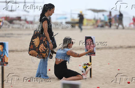 NGO Rio de Paz protests against children shot dead during police operations, at Copacabana beach in Rio de Janeiro